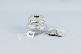 A plain glass dressing table tidy with silver lid, 0.6 ozs and a small parcel of pre 1950 English