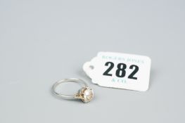 A platinum and diamond solitaire dress ring, the Edwardian cut diamond having a visual estimate of
