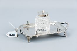 A neat oblong twin handled silver inkstand having a bead border with canted corners and a single cut