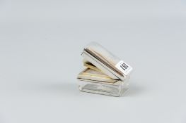 A glass snuff box with starcut base having a gilt silver rim, interior hinged lid and hinged main