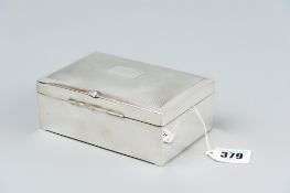 A plain oblong silver cigarette box with engine turned lid, Birmingham 1950