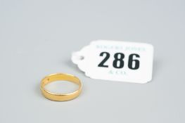 A twenty two carat gold wedding band, 3.2 grms
