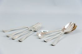 A set of four Georgian period Continental serving spoons, 8.8 ozs and a matching set of four