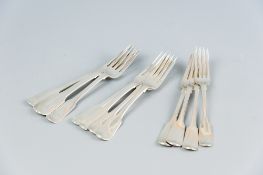 A parcel of twelve mixed fiddle patterned silver dinner forks, majority George IV, 29 ozs