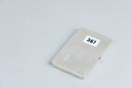 A gentleman's engine turned silver cigarette case, 4 ozs, Birmingham 1946