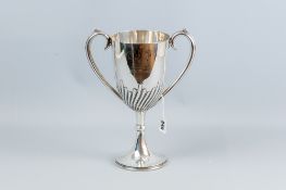 A large silver circular based twin handled billiard trophy cup, inscribed, 11.5 ins (29 cms) high,