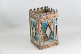 A repousse brass and leaded coloured glass hall lantern shade, 35 x 20 cms