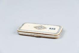 An oblong ivory encased blue silk lined double card holder, the lid having silver rim and mounts