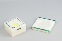 An Art Deco style onyx and malachite desktop cigarette box and ashtray, retailed by Asprey of