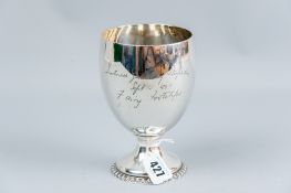 A globular silver vase with presentation inscription to a circular base, 11 ozs, Edinburgh 1894