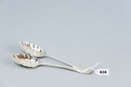A pair of Georgian silver fruit spoons, the bowls with raised pineapples and the tapered handles