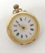 A 12ct gold ladies keyless fob watch with white enamel fancy dial and with botanical study in enamel