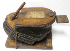 A 'Smoke Helmet' foot-applied bellows by Siebe Gorman & Co, Ltd of London