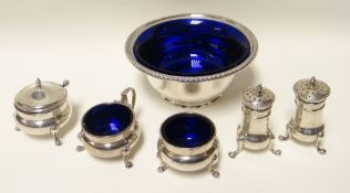 A North American silver footed circular bowl with Bristol-blue glass liner, marks for retailer Birks