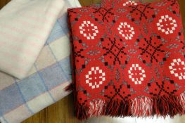 A good red patterned black, grey and white chequered Welsh blanket, 81 x 74ins (206 x 188cms); and a