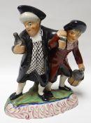 A Staffordshire model 'The Parson and the Curate' on their inebriated walk home with lantern and