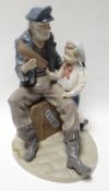 A Lladro model of a seated ‘old salt’ romanticising about the sea with a model boat in his hand