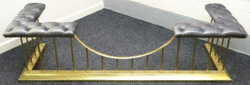 A brass club-fender with buttoned and studded leather corners, circa 1900, 198cms