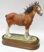 A Royal Worcester model of a 'Clydesdale Stallion', No.329, dated 1976, on an oval base with