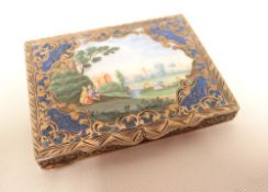 An Italian silver gilt foliate-decorated compact with enamelled landscape scene to the hinged lid