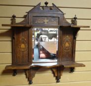 A marquetry and inlaid rosewood mirrored shelf rack, 29.5ins high (75cms)