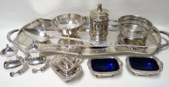 A shaped footed EPNS twin-handled tray with pierced gallery and on four claw feet; together with a