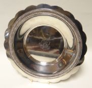 An American silver lobed dish with monogrammed interior, base marks for Gorham and retailed by