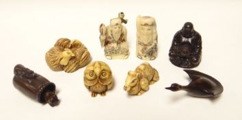Three wood carved netsukes, two bone netsukes and three composition similar