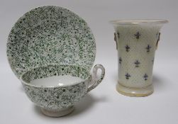 A Swansea pottery 'Sea Weed' pattern cup and saucer (bearing label for the collector Harold Davies);