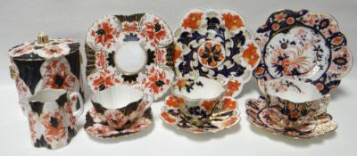 An eleven piece Wileman part-tea service in the Imari palette, together with a pair of similar