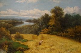 CHARLES H PASSEY oil on canvas - figure harvesting stooks of corn with river landscape beyond,