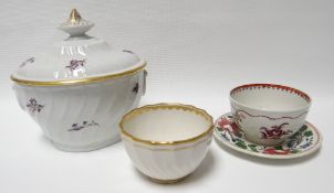 An eighteenth century Derby tea-bowl, a similar period New Hall tea-bowl, a pearlware dish and a