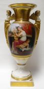 A Continental, possibly Austrian, twin-handled porcelain pedestal vase, the handles in the form of