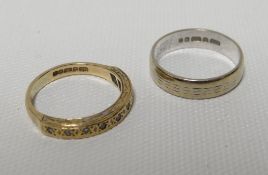 A 9ct yellow gold half-hoop eternity ring, 2.4gms; together with an 18ct white gold wedding band,