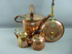A large copper watering can, a copper and brass warming pan, a small copper kettle with brass handle