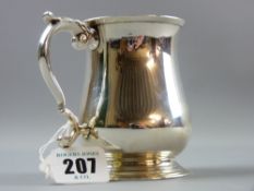A silver pedestal tankard of waisted form with scrolled handle, 6.2 ozs, Chester, possibly 1912