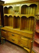 A late 19th/early 20th Century solid oak Art Nouveau dresser sideboard, six section rack with