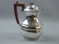 A silver coffeepot of oval form with step and lined decoration, 20 ozs gross, Birmingham 1931