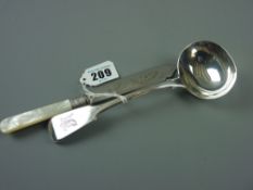 A fiddle patterned silver sauce ladle, 2.3 ozs, London 1867 and a mother of pearl handled butter