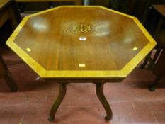 An Edwardian rosewood crossbanded and inlaid octagonal topped occasional table having four shaped
