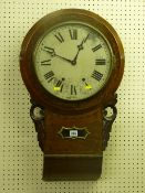 A 19th Century walnut and crossbanded drop dial wall clock, eight day movement striking on a bell,