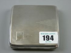 A gent's engine turned silver cigarette case, 3.6 ozs, Birmingham 1932