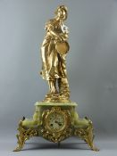 A French onyx and gilt metal figural mantel clock with painted dial and plaque to the figure base '