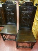 A pair of oak 17th Century style high back side chairs, rectangular backs with chamfered uprights