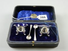 A cased pair of silver cauldron salt pots, each piece with wavy bead rim on three pad supports