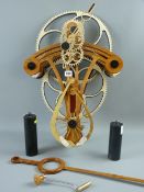 A 20th Century hand crafted skeleton wall clock, twin weight with 4ft pendulum, approximate
