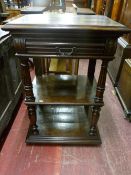 A late 19th Century European oak single drawer three tier hall table with reeded and turned
