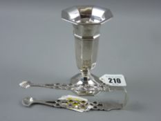 A pair of early 19th Century sugar nips of twist and pierced form with shell bowls, undated, maker