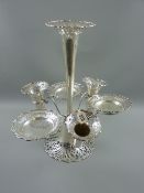 An all silver epergne having a pierced upturned trumpet base with plain tapering centre trumpet