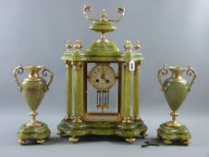 A French onyx and gilt metal clock garniture set with good shaped base, six pillared temple style